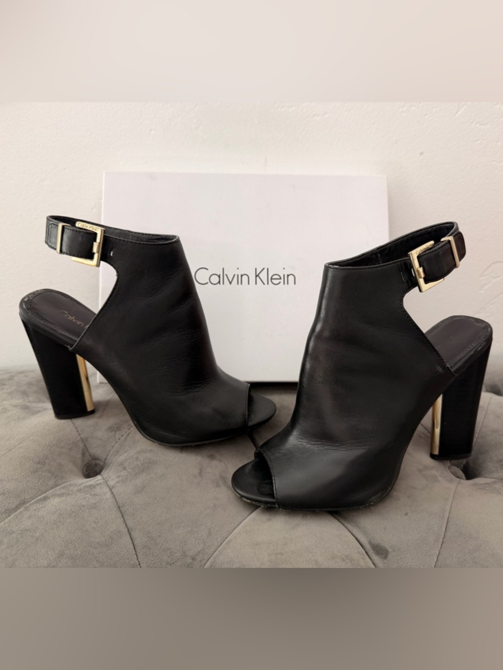 Calvin Klein Zola Cow RomaBlack Leather Peep-Toe Ankle Shooties with Gold Buckle